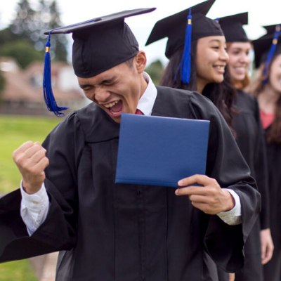 high school graduate celebrating